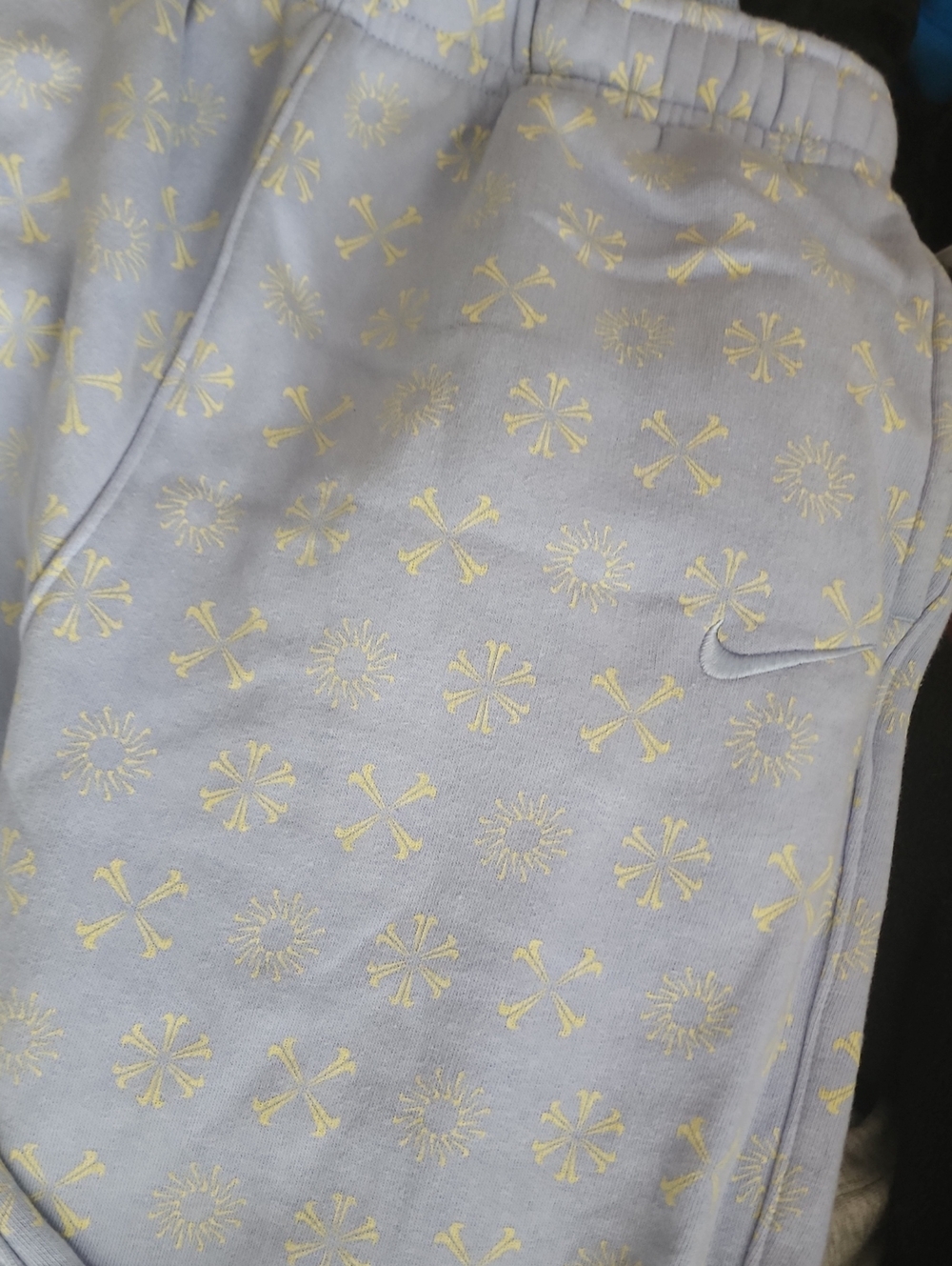 Nike Light Blue Sweatpants with Yellow Embroidered Motifs